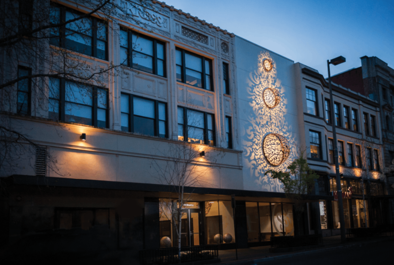 The Kress Building illuminated at night — 932 Broadway, Tacoma WA